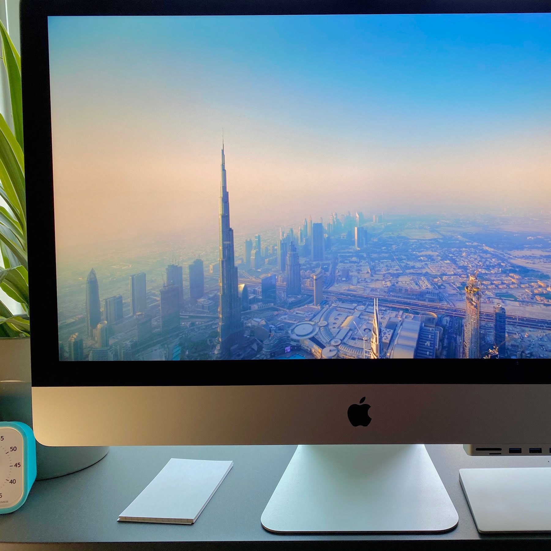 iMac desktop with arial screensaver