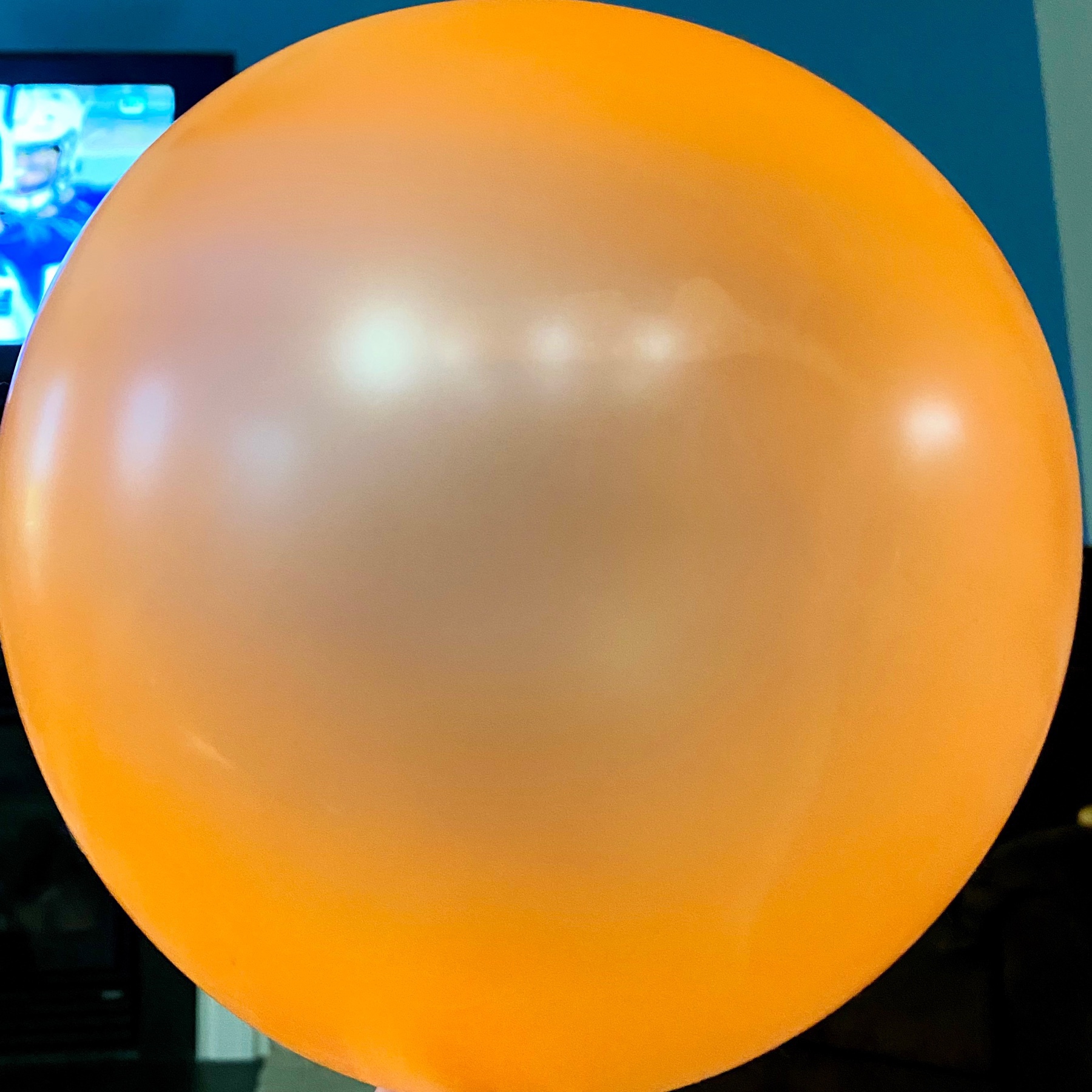 inflated orange balloon 