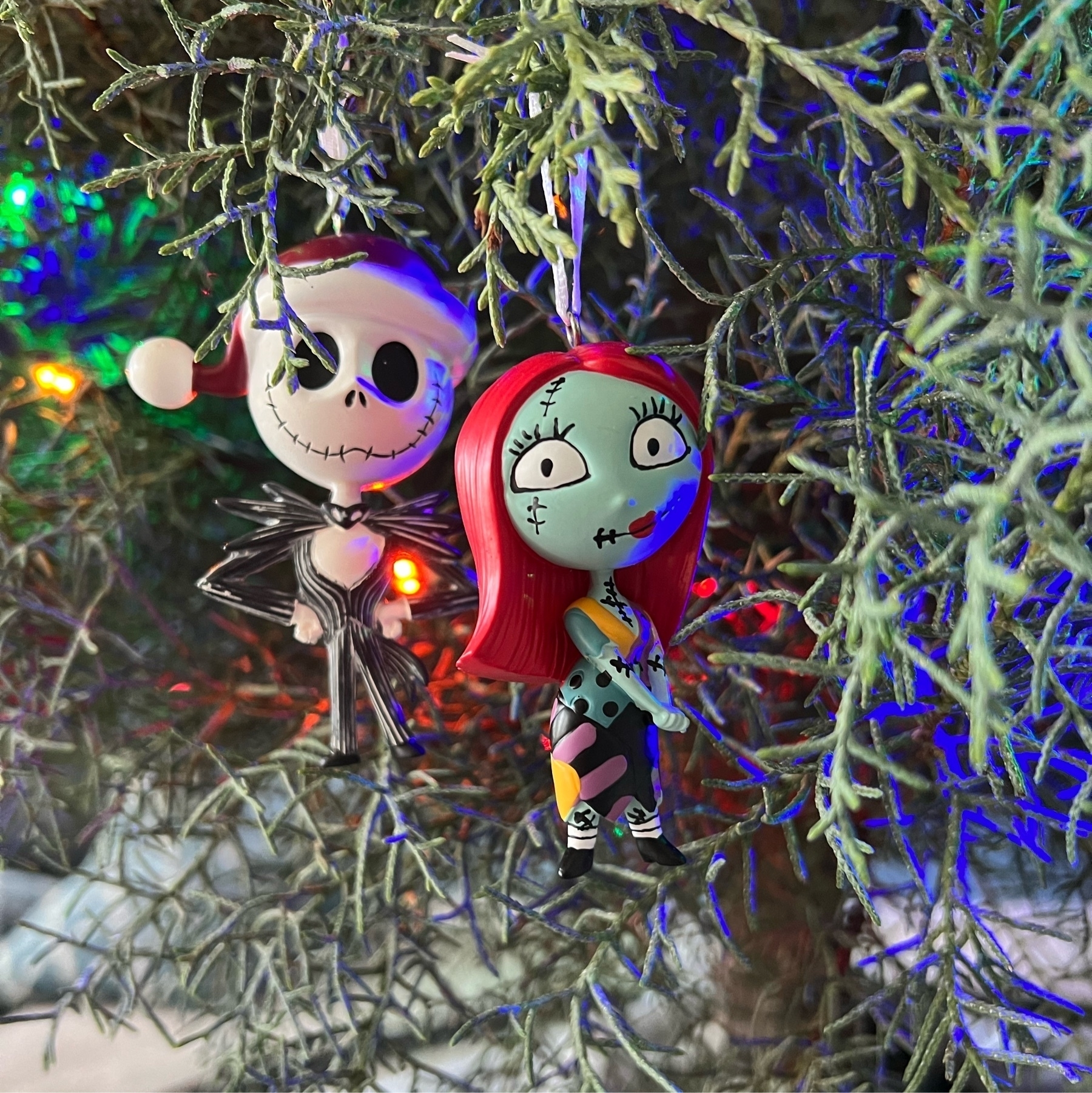 Jack and Sally ornaments on a Christmas tree