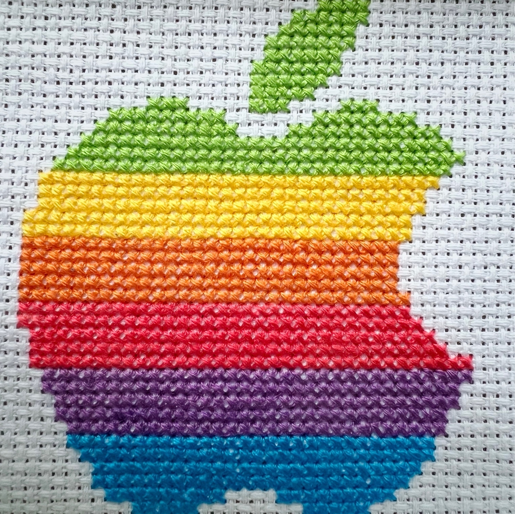 stitched rainbow Apple logo